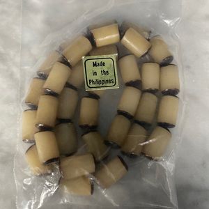 Bead, buri nut (coated), 11x6mm-13x8mm tube.